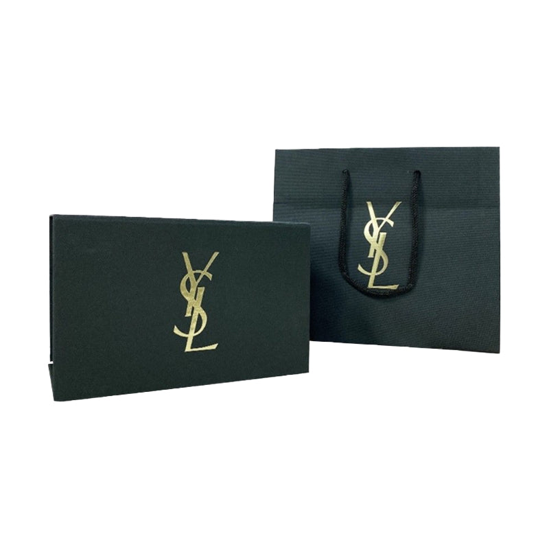 روج بشعار YSL بعلبة فضية أسطوانية، لقطة من صور المنتج