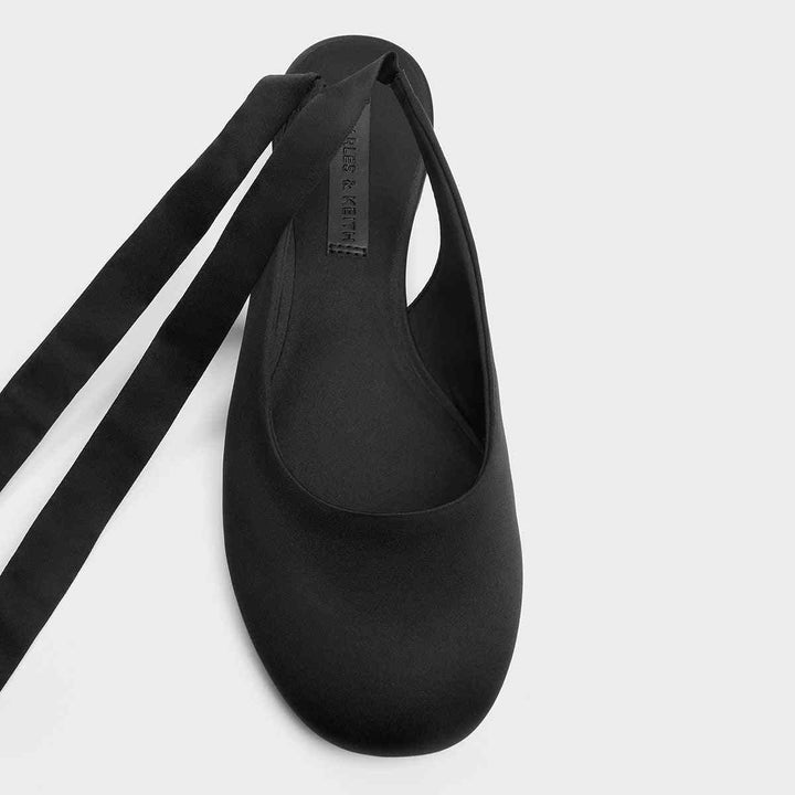CHARLES&KEITH satin lace-up flat shoe with round toe design.