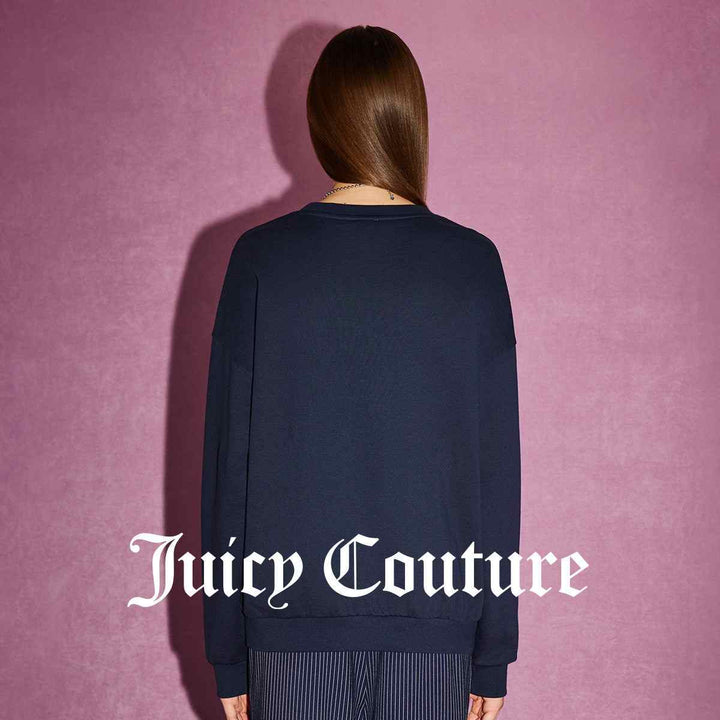 Juicy Couture navy sweatshirt with pink flamingo embroidery and elegant logo.