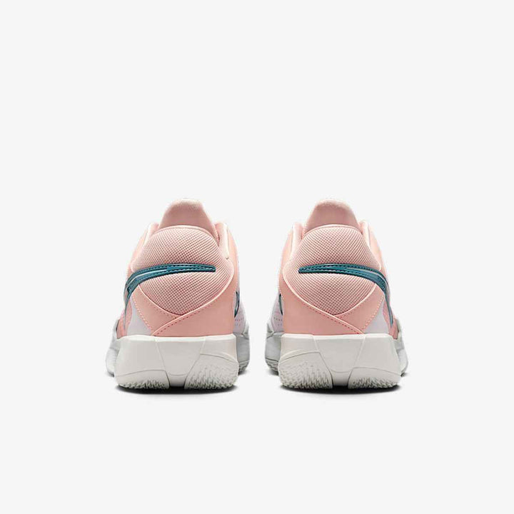 Nike GT Cut 2 sneakers in pink and light blue, featuring Air Zoom technology and a dynamic design for basketball enthusiasts.