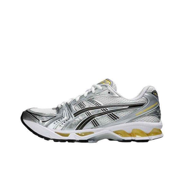 White and Tai-Chi Yellow GEL-KAYANO 14 sneaker featuring advanced GEL™ shock absorption and TRUSSTIC™ support system.