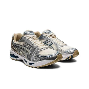 Asics Gel Kayano 14  حذاء ذهبي فضي.