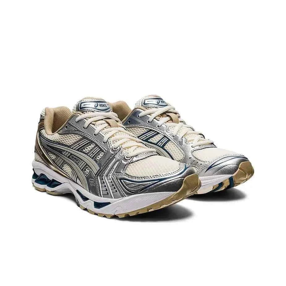 Asics Gel Kayano 14  حذاء ذهبي فضي.