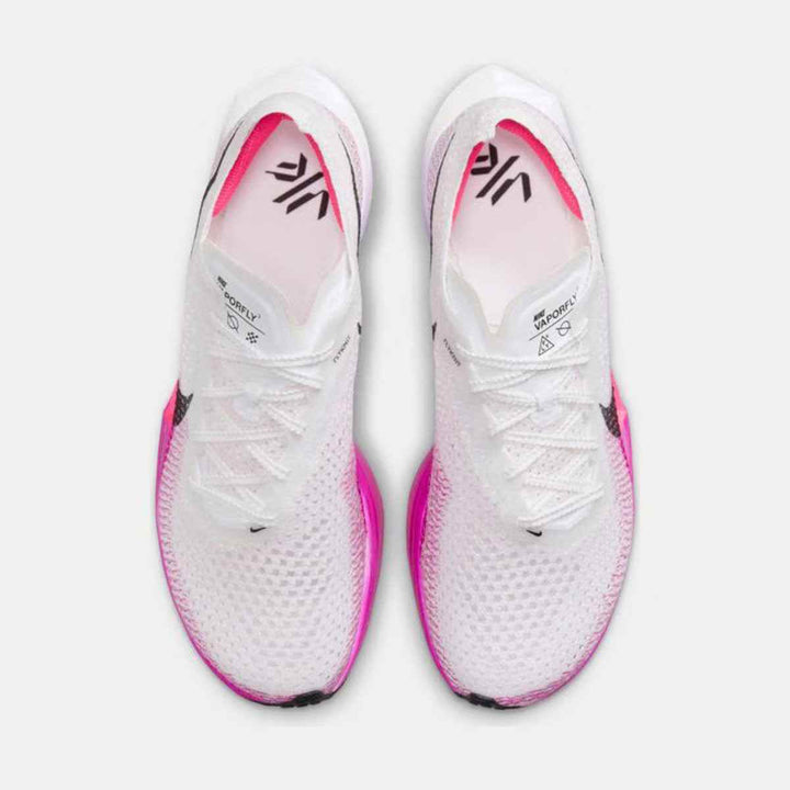 White and pink Nike Vaporfly shoes with Flyknit upper and ZoomX cushioning.