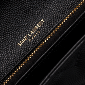 محفظة Saint Laurent جلد أسود بشعار ذهبي.