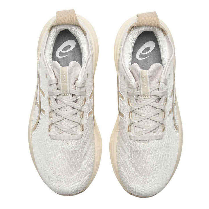 ASICS Gel-Nimbus 27 beige running shoes with advanced cushioning and breathable mesh design.