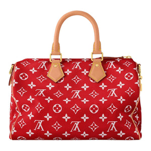 حقيبة Louis Vuitton Speedy 30 باللون الأحمر المميز.