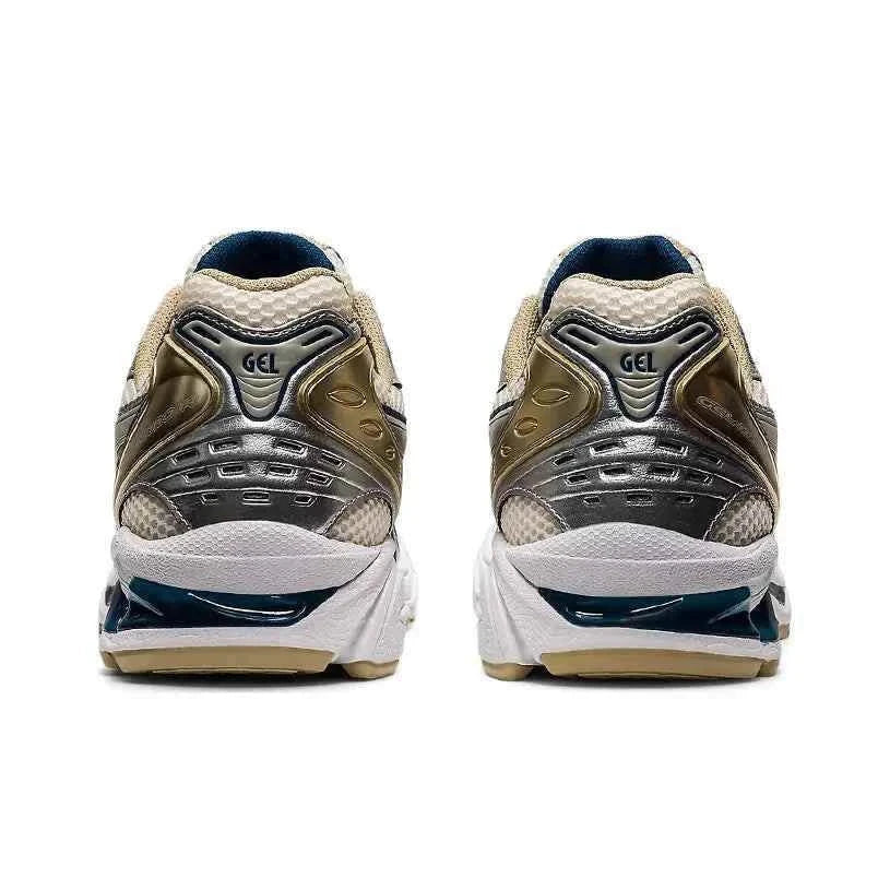 Asics Gel Kayano 14  حذاء ذهبي فضي.