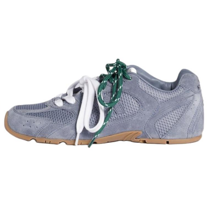 حذاء New Balance x MIU MIU NB 530 SL بجلد الغزال الرمادي مع شبك تنفسي ونعل مطاطي بلون غامق وأربطة بيضاء وخضراء للأناقة والراحة اليومية