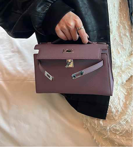 Racechoice Crossbody Bag in premium purple with wide strap and stylish design.