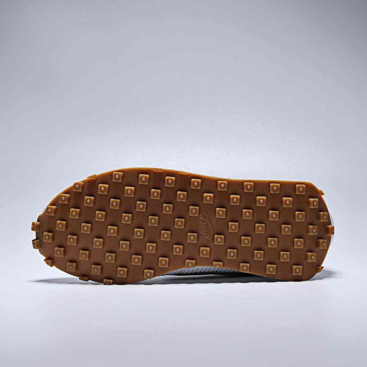 Nike LD-1000 shoe sole with wide heel and textured grip designed for long-distance runners.