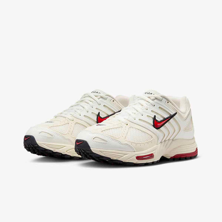 Nike Air Pegasus 2006 sneakers in sail, coconut milk, and black with red accents.