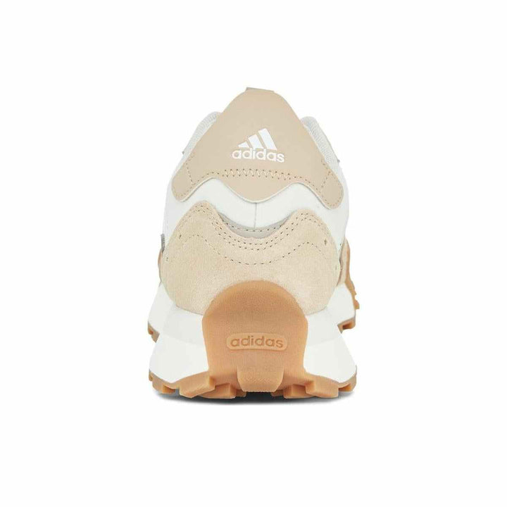 adidas classic sports shoe with suede details in beige and white, featuring a rubber sole.