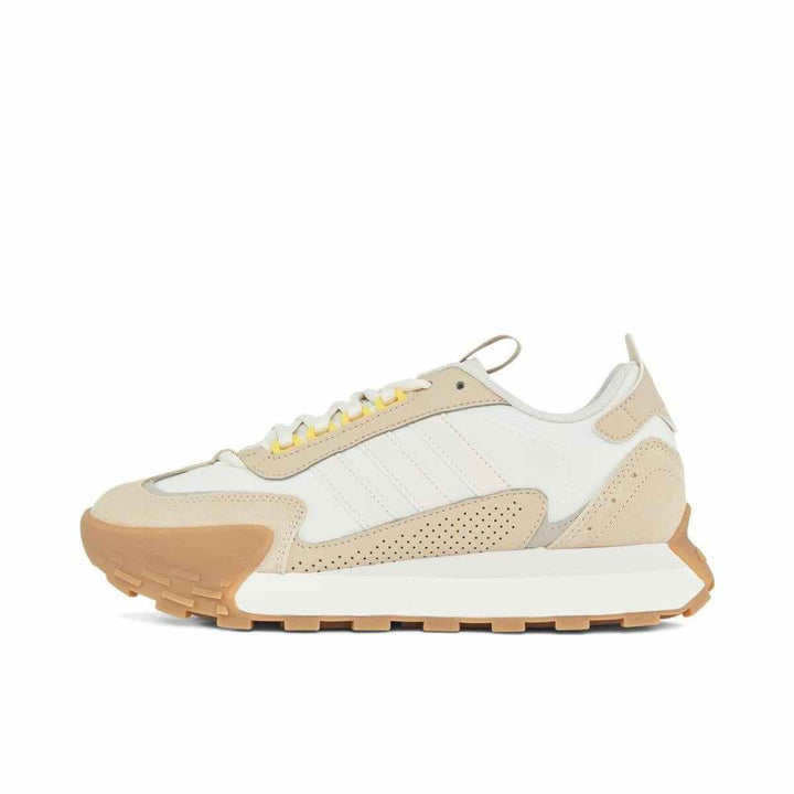 adidas classic sports shoe with suede accents in beige and white.