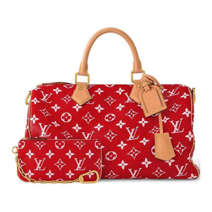 حقيبة Louis Vuitton Speedy 30 باللون الأحمر المميز.