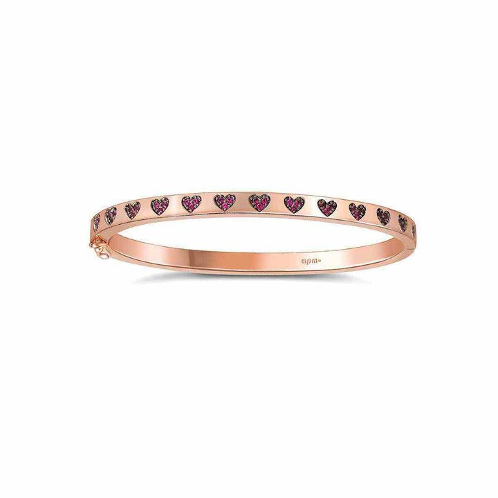 Rose gold bracelet with pink crystal hearts by APM MONACO.