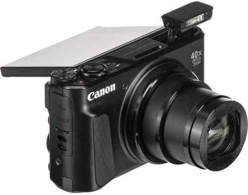 Canon PowerShot SX740 HS black digital camera with 40x optical zoom and tilted LCD screen, compact and lightweight for travel photography.