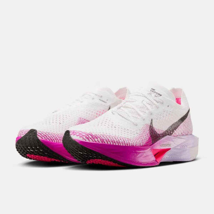 Lightweight Nike VaporFly shoes with Flyknit, ZoomX cushioning, carbon plate, and dynamic white and pink design.