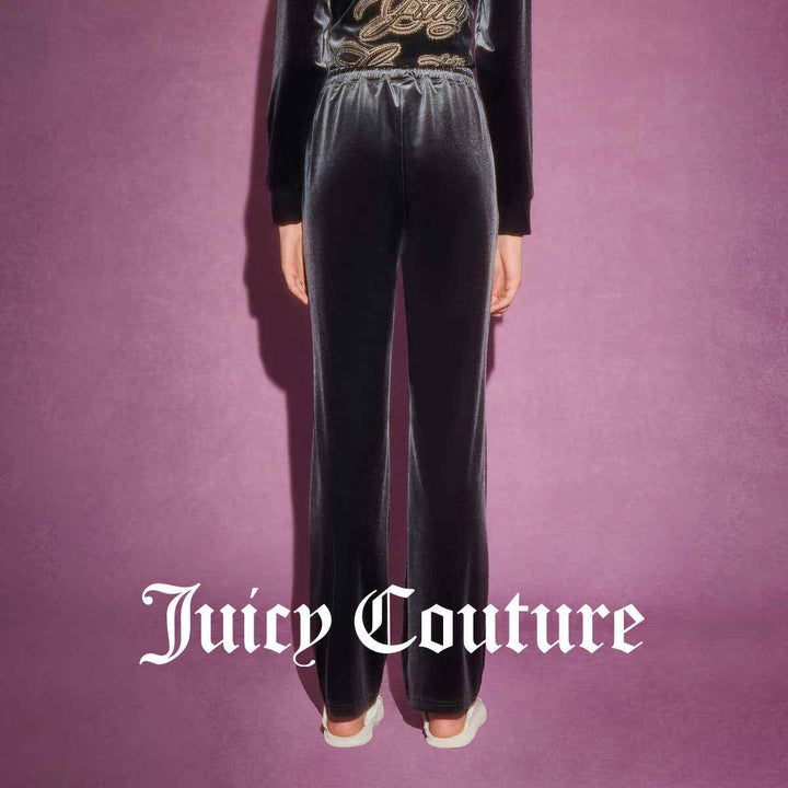 Juicy Couture black velvet pants with crystal logo embroidery, elegant and comfortable design.