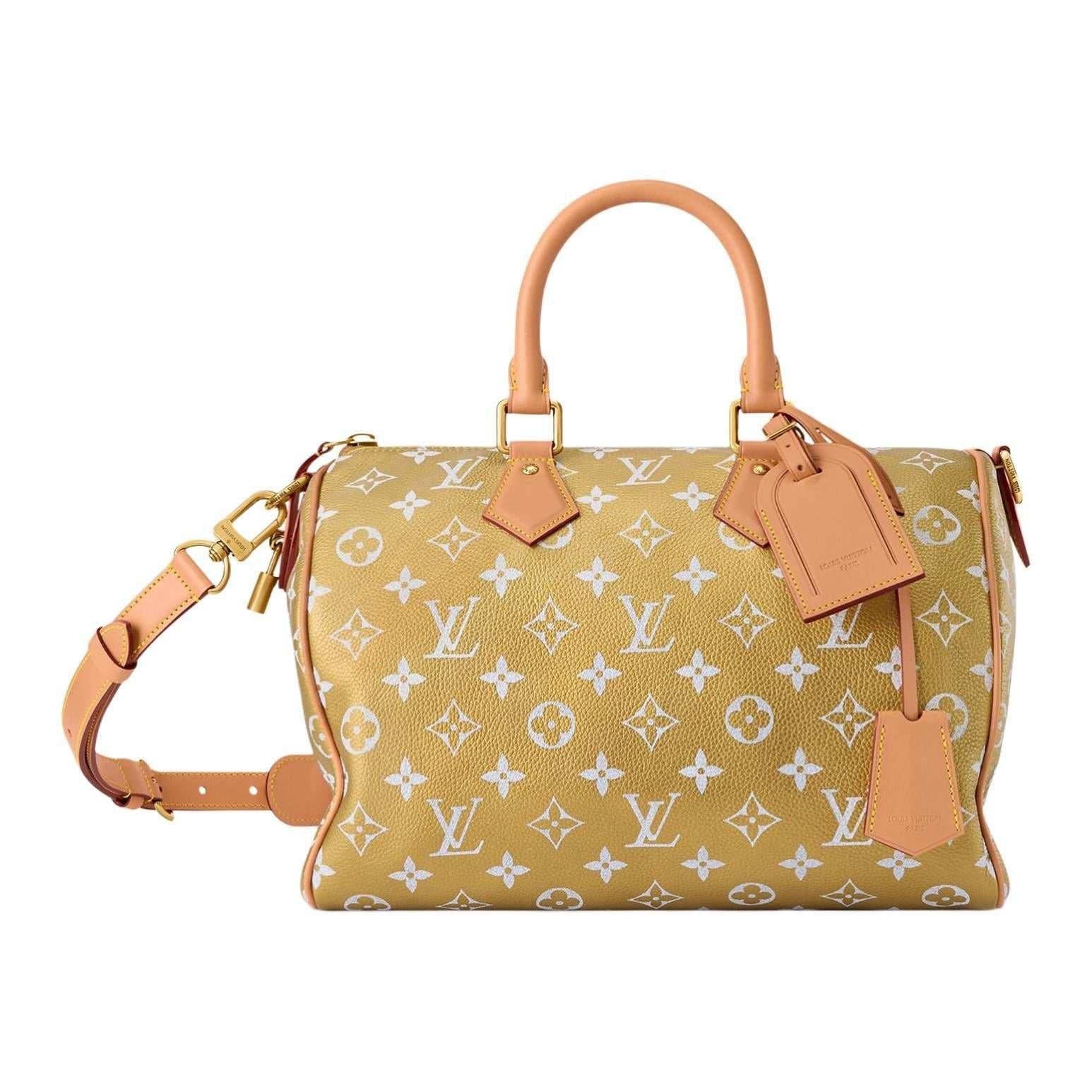حقيبة Louis Vuitton Speedy Bandoulière بتصميم مميز باللون الذهبي.