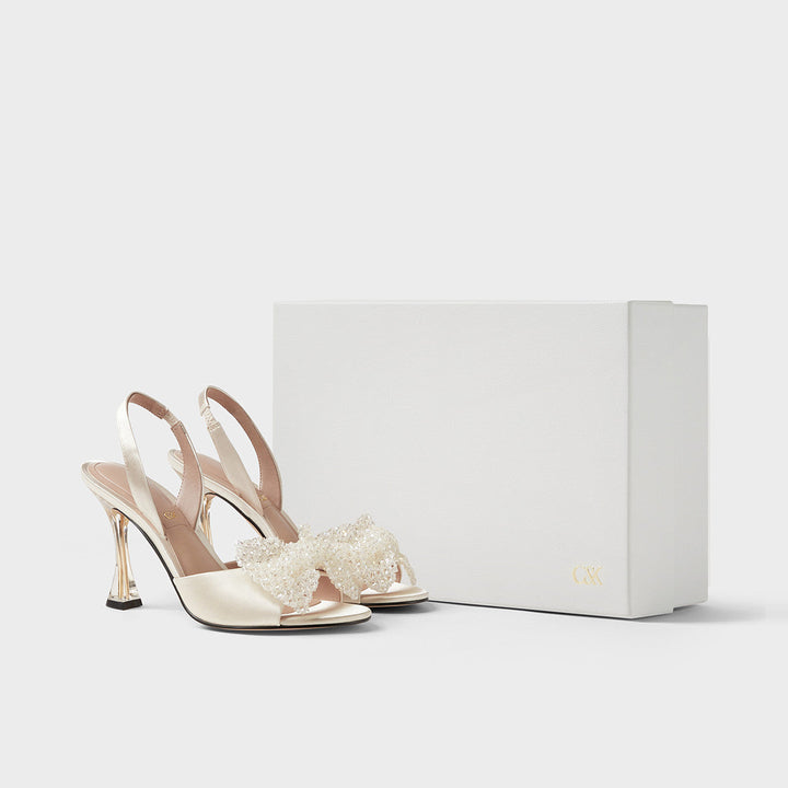 CHARLES&KEITH recycled high heels with decorative bow and elegant box.