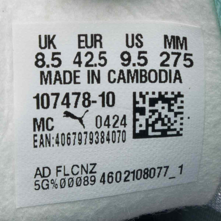 Puma football shoe label showing size and manufacturing details.