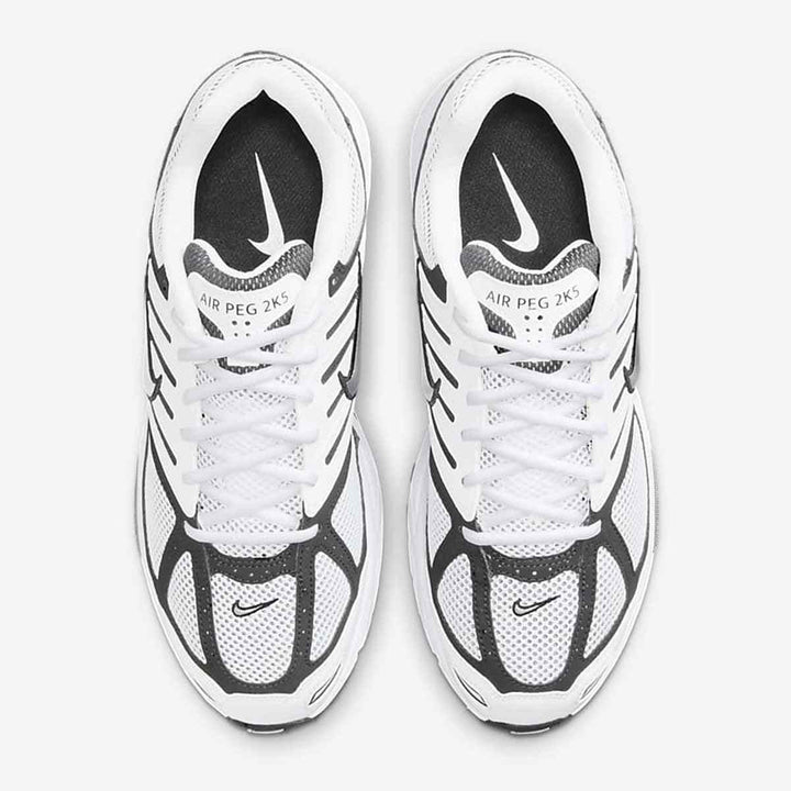 White and black Nike Pegasus 2K5 sneakers with classic design and modern performance.