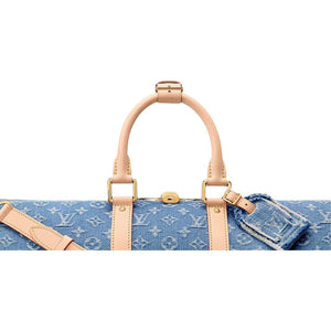 حقيبة سفر Louis Vuitton Keepall قماش Denim باللون الأزرق.