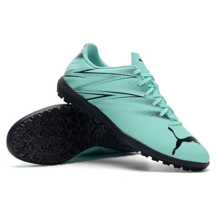 Puma turquoise and black football shoes for artificial grass surfaces.