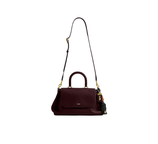 شنطة كوتش COACH ROGUE 35 جلد ناعم عنابي مع حزام قابل للتعديل وحوافظ داخلية واسعة