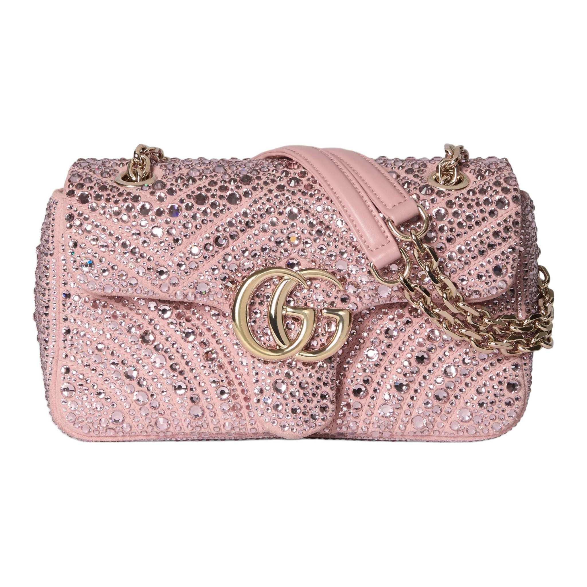 حقيبة Gucci Marmont مزينة بالكريستال باللون الوردي.