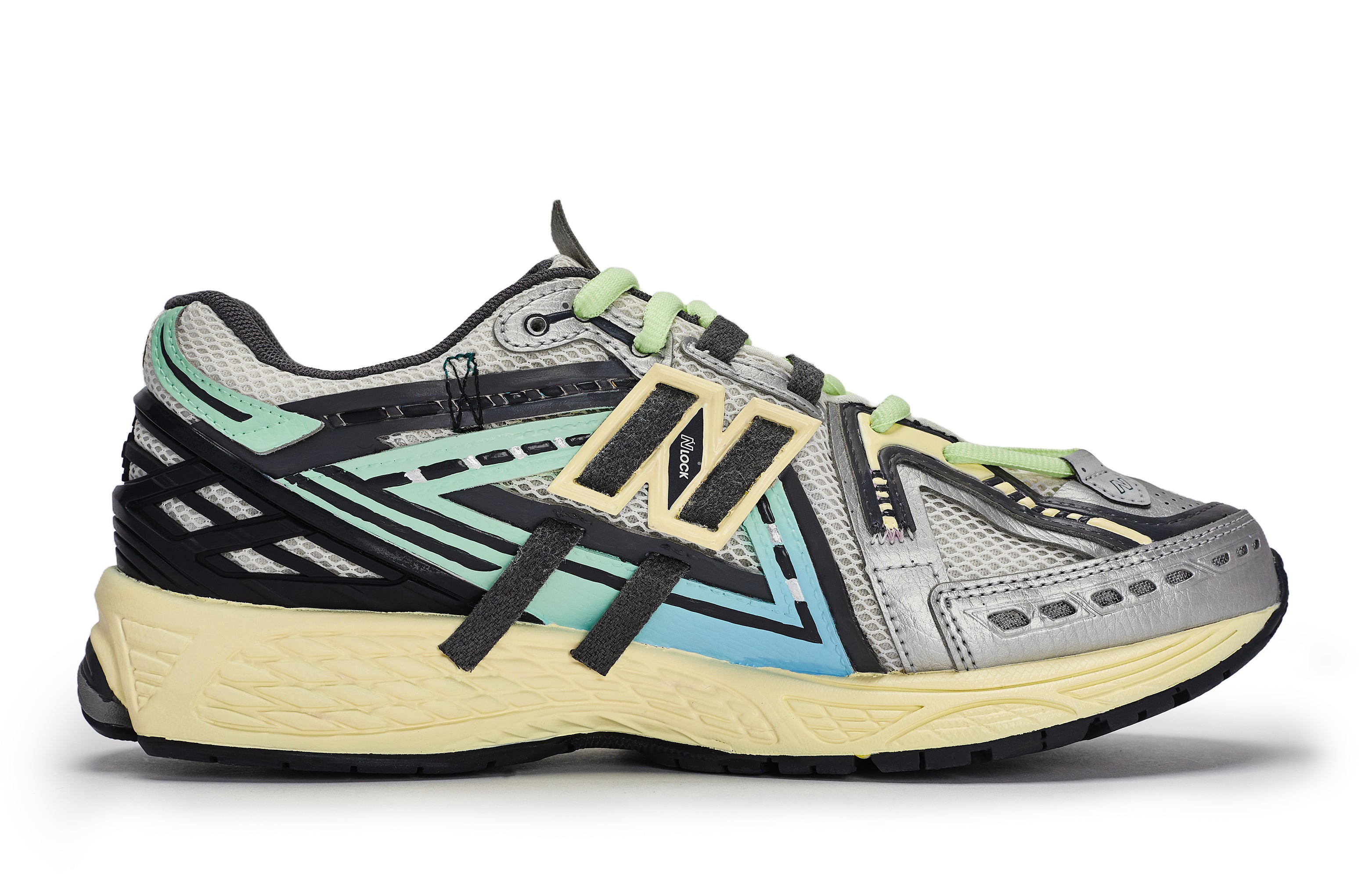 حذاء رياضي New Balance 1906A رمادي وأخضر