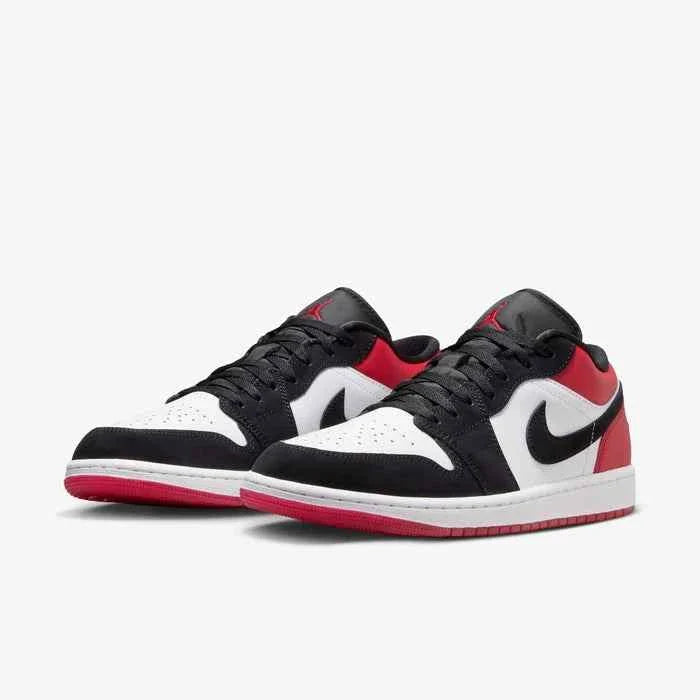 Air Jordan 1 Low men's shoe in white, red, and black, inspired by the original 1985 design.