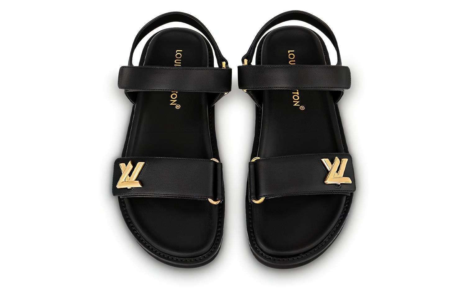 Louis Vuitton صندل Flat نسائي جلد أسود مريح بشعار ذهبي.