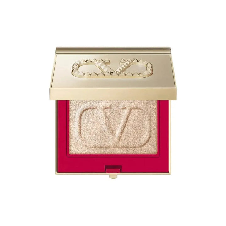 Valentino Beauty illuminating powder with gold shimmer in elegant gold and red compact