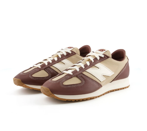 New Balance casual brown unisex shoe with white N logo and rubber gum sole