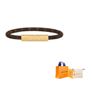 سوار Louis Vuitton بتصميم جلد Monogram وقفل ذهبي أنيق.