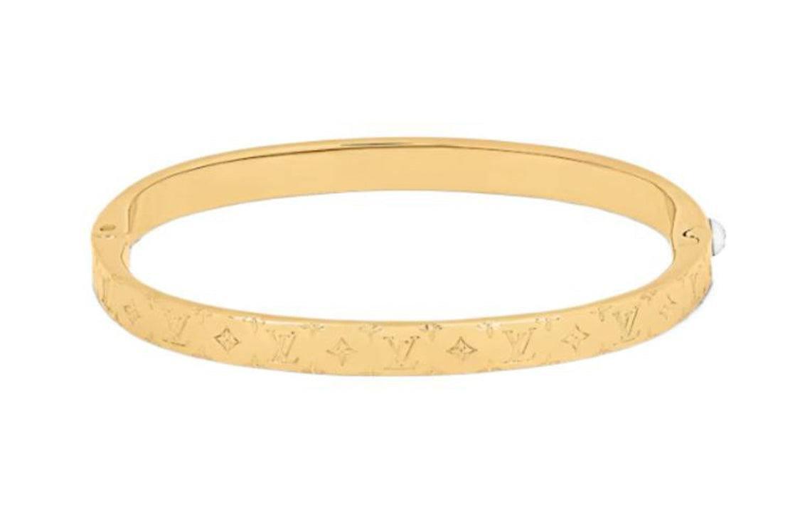 LOUIS VUITTON Logo engraved metal bracelet women's gold.