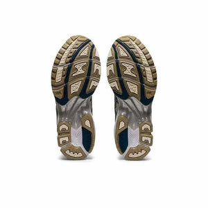 Asics Gel Kayano 14  حذاء ذهبي فضي.
