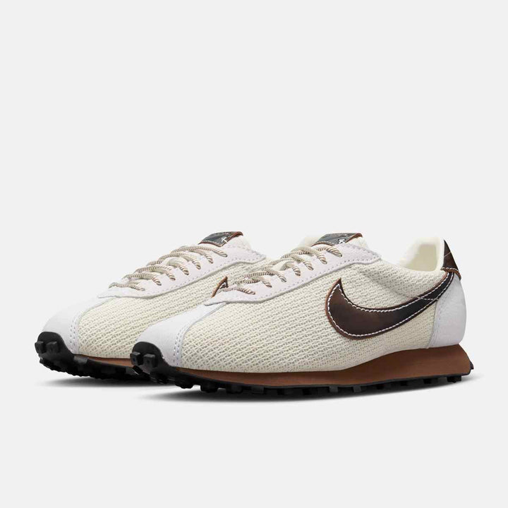 Nike LD-1000 running shoes with wide heel, durable leather and mesh upper, waffle outsole, soft pearl, black, and fauna brown colors