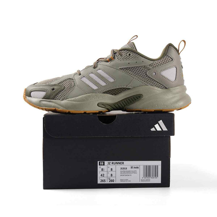 adidas JZ Runner in olive and grey with orange accents on display box, designed for comfort and durability.