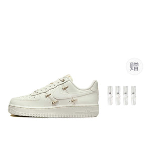 Nike Air Force 1 Mini Gold.