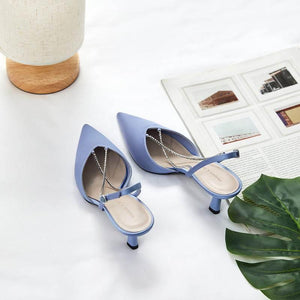 حذاء كعب Slingback أزرق فاتح مرصع بالكريستال CHARLES & KEITH.