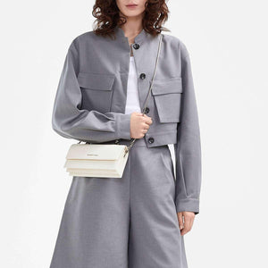 حقيبة Charles & Keith بمقبض علوي معدني وتصميم Crossbody.