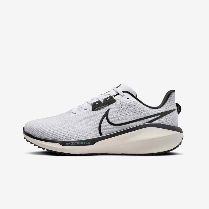 Nike ZoomX Pegasus 40 running shoe, white with black accents, featuring lightweight mesh upper and ZoomX cushioning.