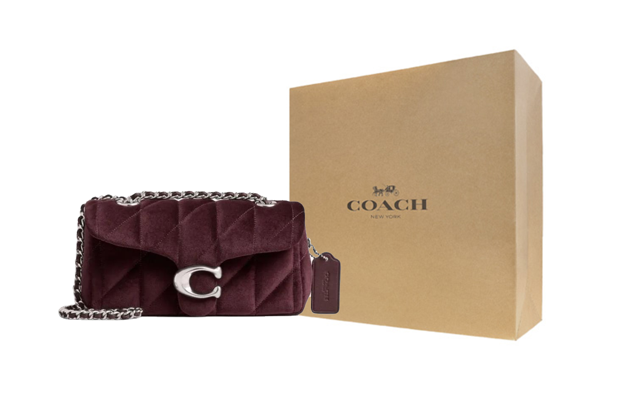 حقيبة كتف Coach مخمل مبطنة لون عنابي.