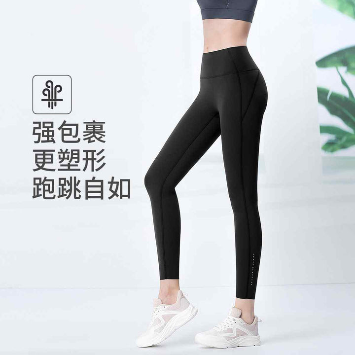 High waist belly tuck yoga pants for women, showcasing slimming and supportive fit.