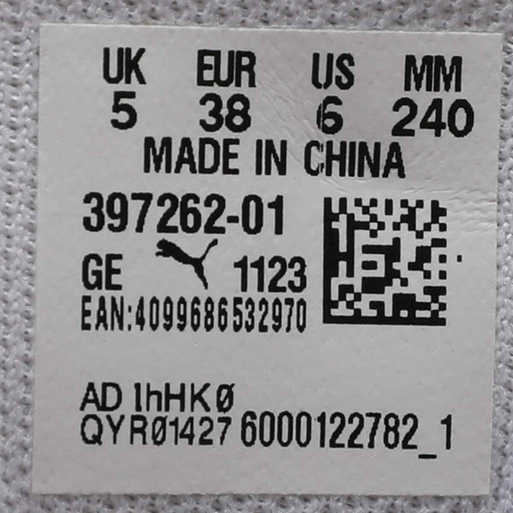 Puma sneaker label showing UK, EU, and US sizes, made in China.