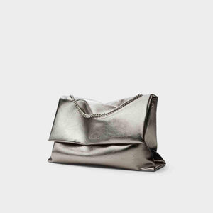 حقيبة Charles & Keith لون Metallic Silver مع سلسلة كتف.