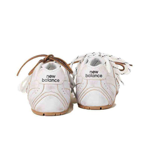 سنيكرز 530 أسفل الكاحل جلد نيو بالانس × ميو ميو New Balance X Miu Miu.